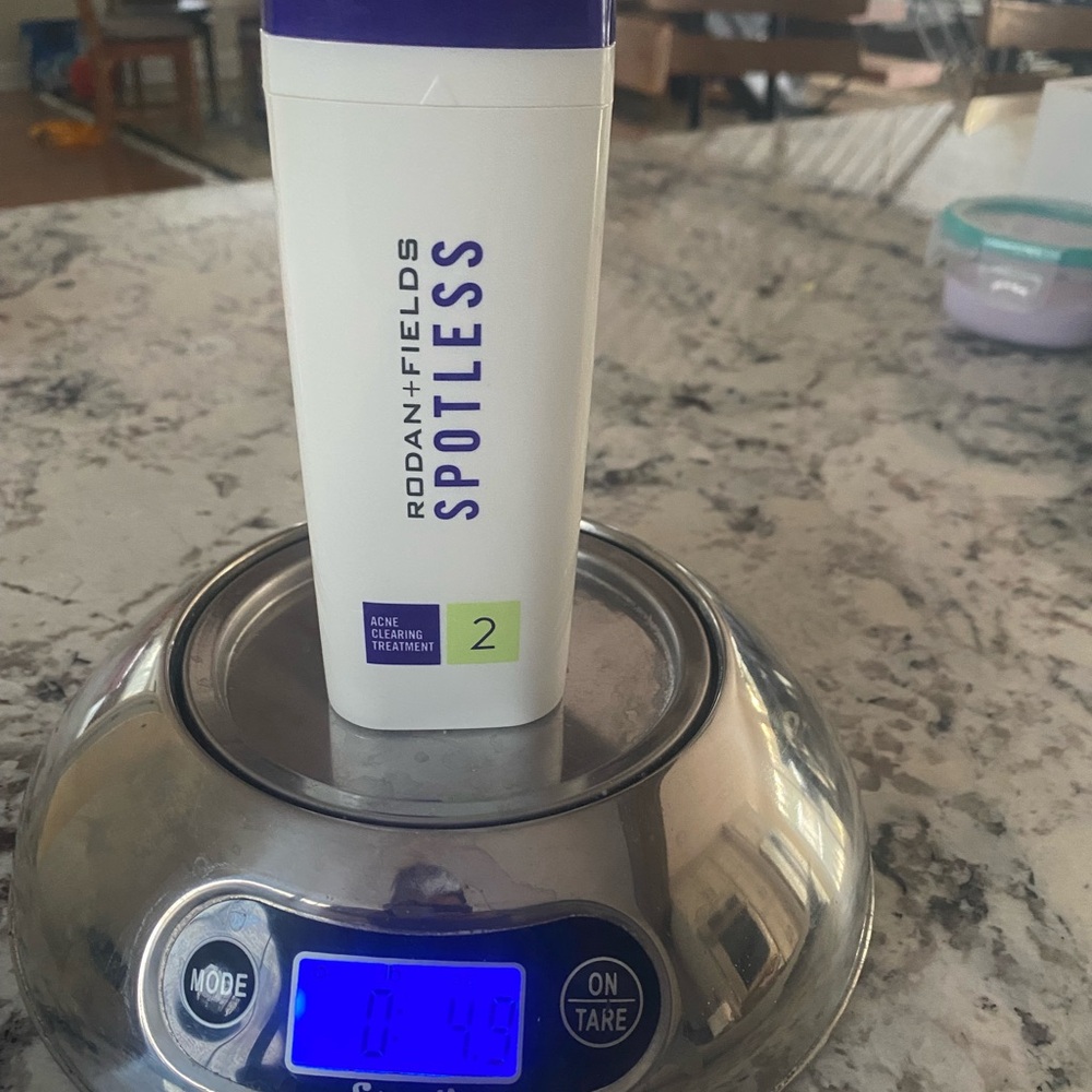 Rodan + Fields Spotless Acne Cleanser with Purple and White Packaging